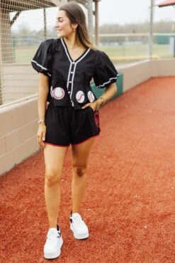 Queen Of Sparkles Black Peplum Baseball Top